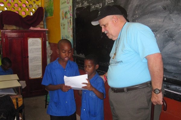Roger with the students he taught in St. Lucia with Global Volunteers
