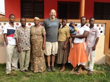 Matthew, a volunteer with GVN - Ghana, posing for a picture with new friends