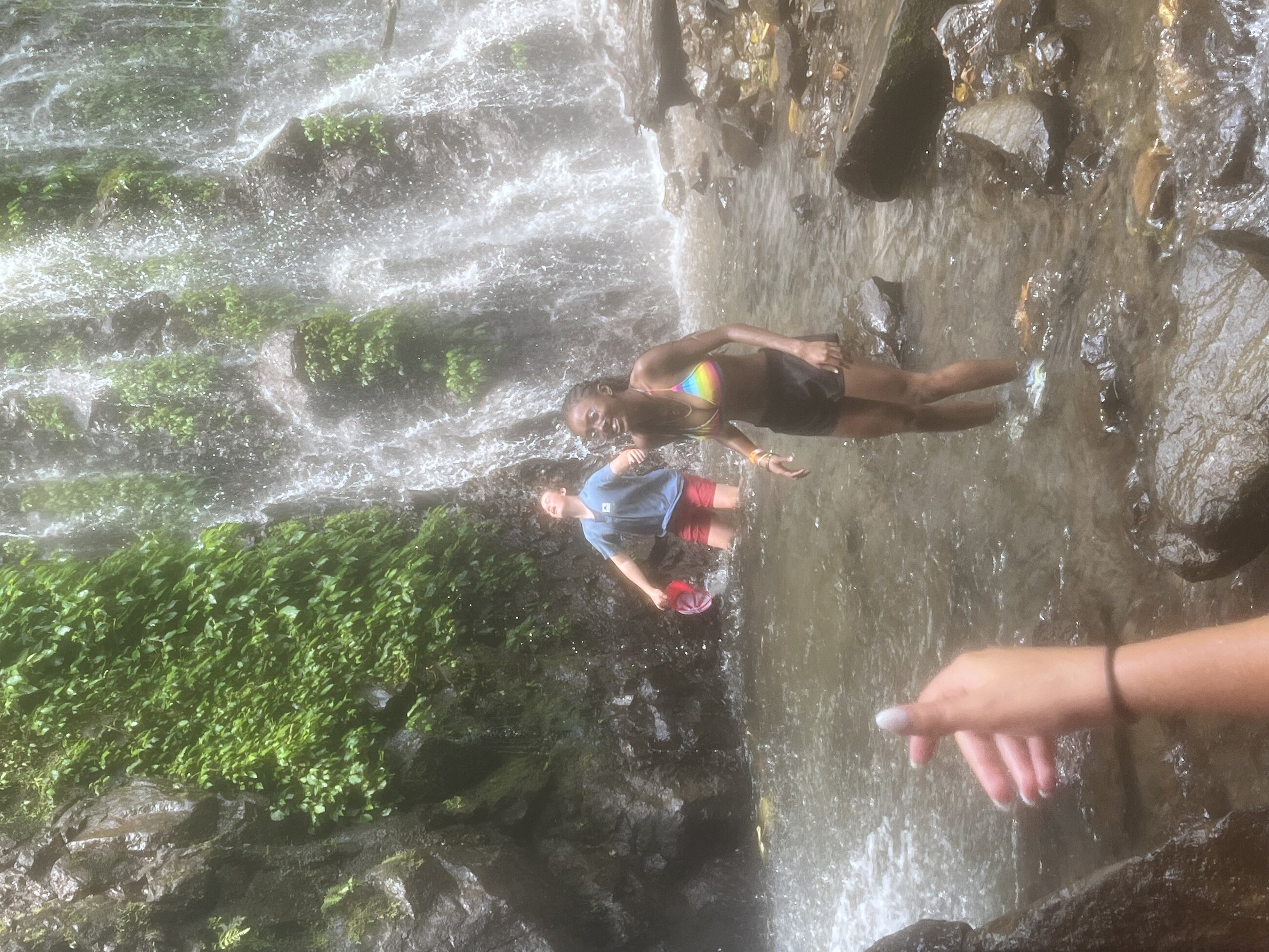 Tiffany and Jacob enjoying the beautiful waterfall in El Tigre Waterfalls of Monteverde.