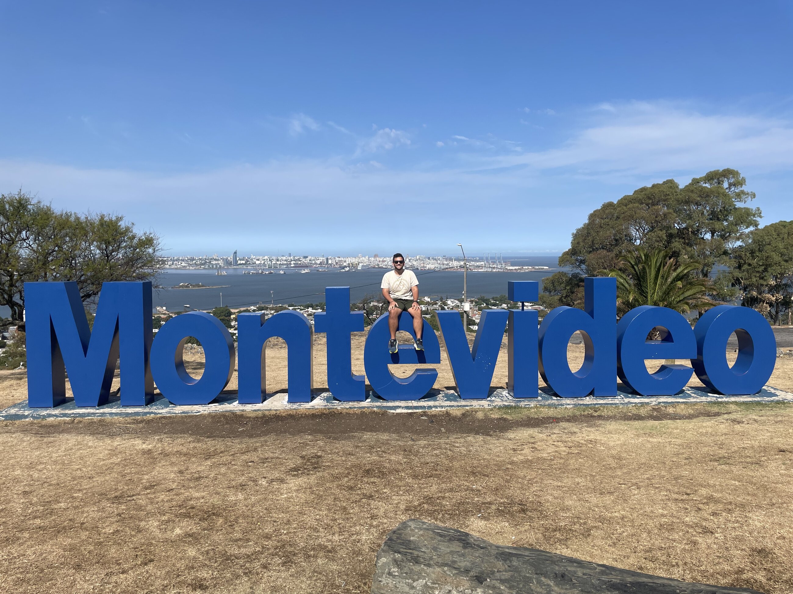 Here I am at a "Montevideo" sign overlooking the city from Fortaleza del Cerro de Montevideo.