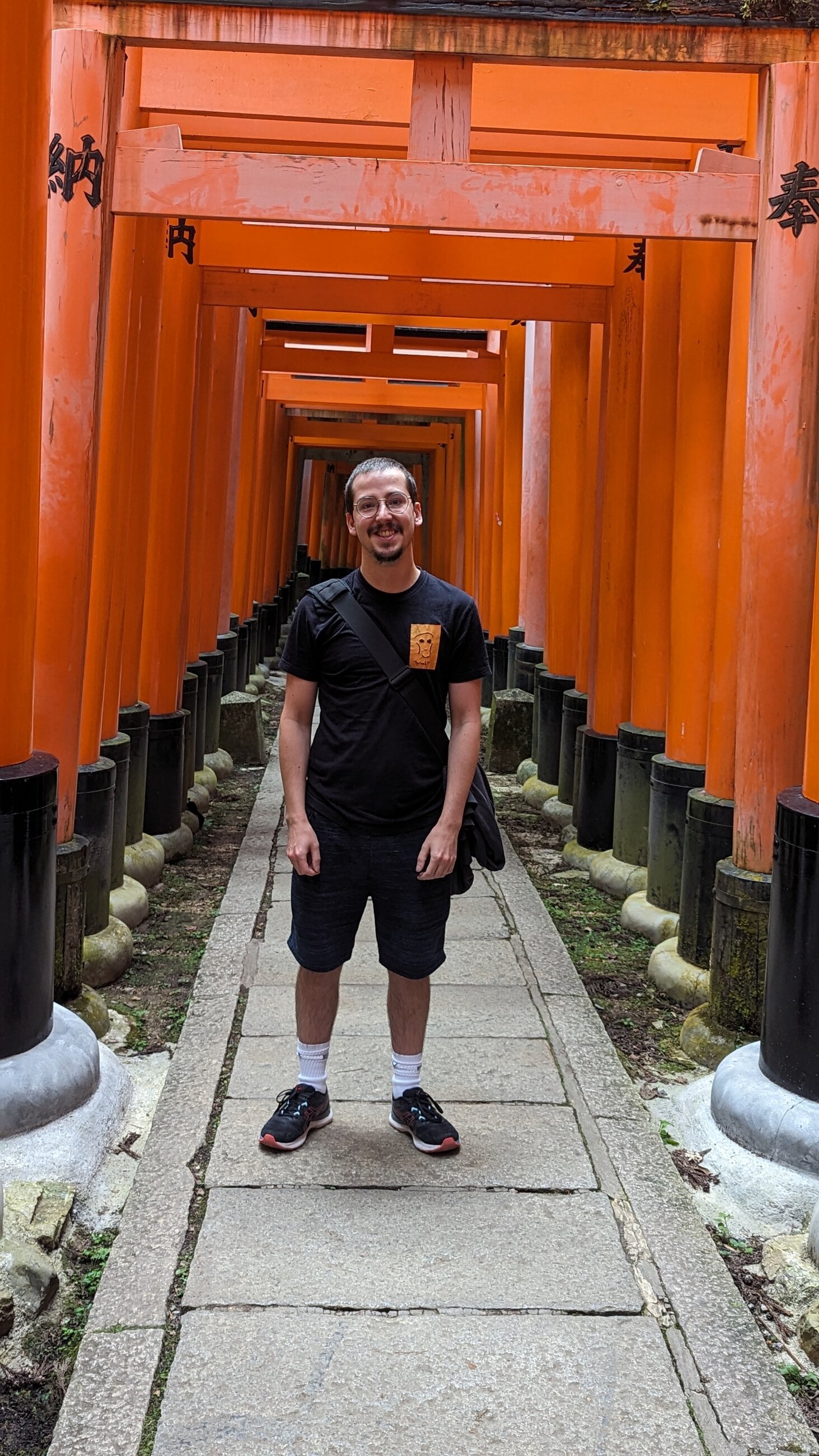 Under Fushimi Inari torii gates in Kyoto. An hour away from my placement.