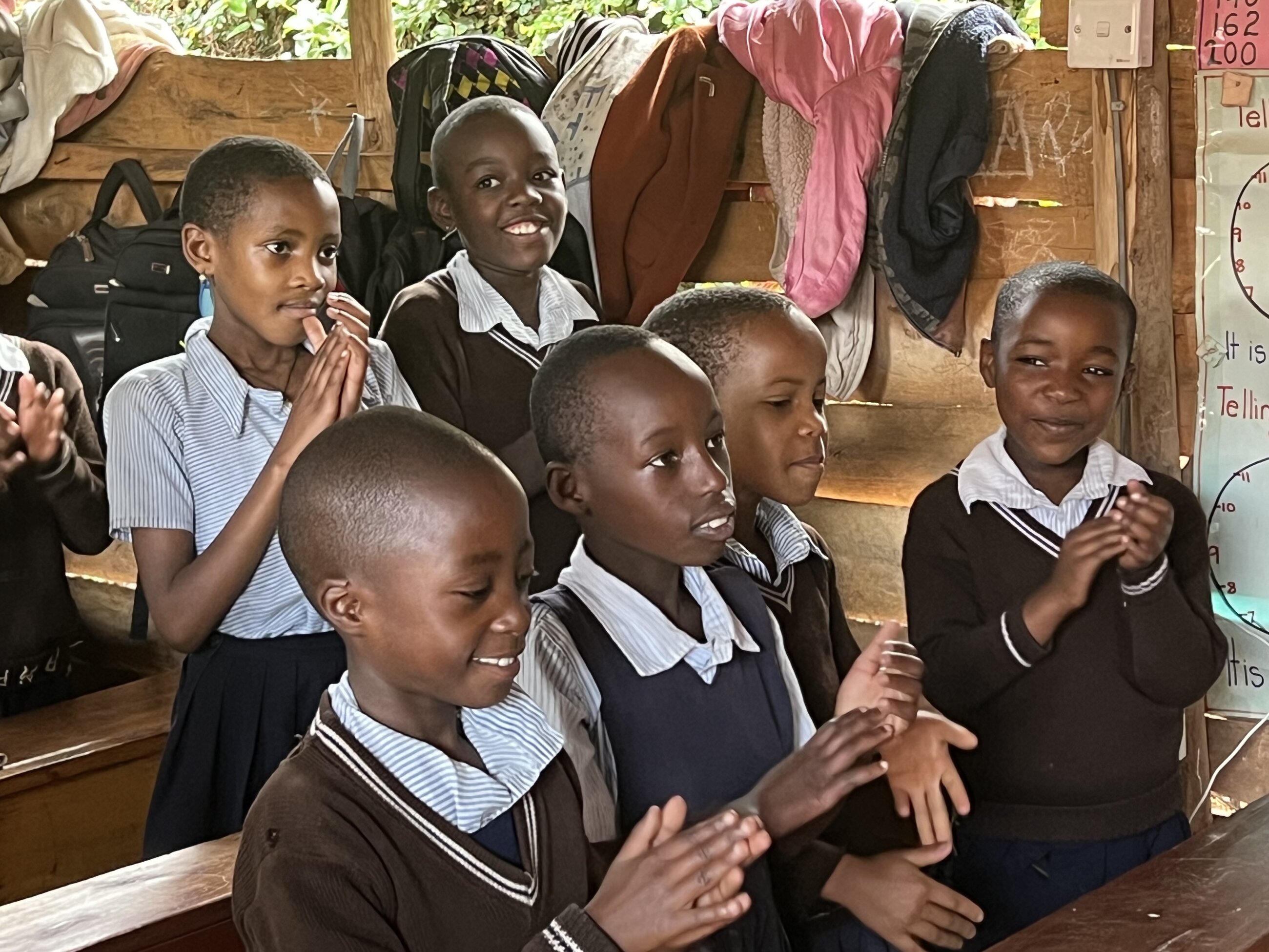 Students singing in the classroom