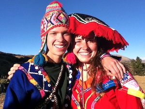Two girls in costume in Peru