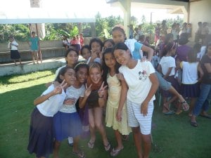 Stacey having a fun time volunteering with kids via GVN in the Philippines