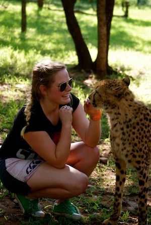 Woman with a cheetah