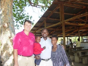Man in Tanzania with family