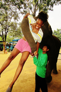Ke'Bri and her best friend, an elephant