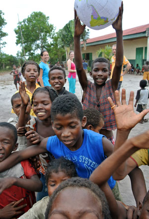 Azafady volunteers with local children in Madagascar