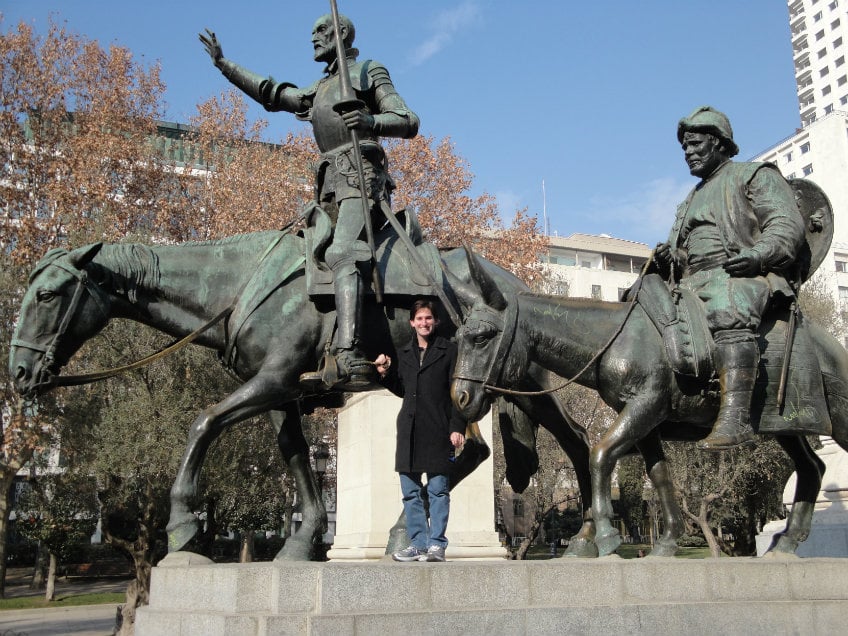 Student in front of statues
