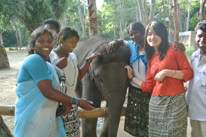 Liqian with some women...and an elephant!