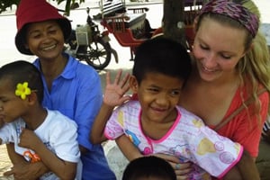 Volunteer working with kids in Cambodia 