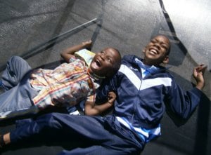 Two of severely disabled children with us on the trampoline