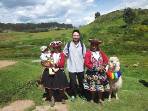Pierre and locals with a llama