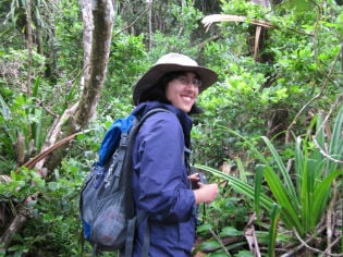 woman hiking in rainforest