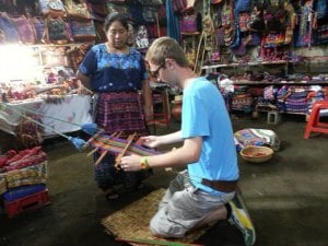 Sam Ross at a weaving cooperative in Guatemala. 