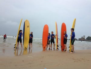 students surfing at Plage de Vieux Port