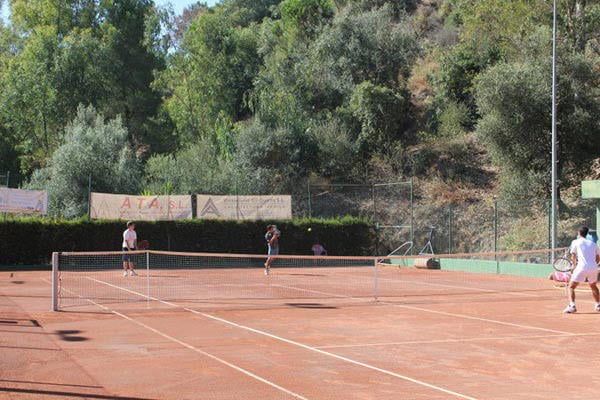 Playing tennis in Spain