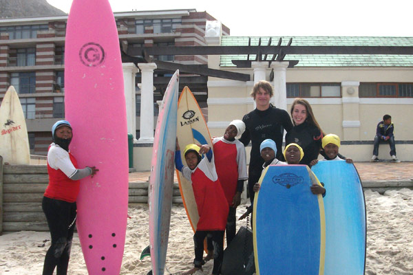 Teaching local kids how to surf!
