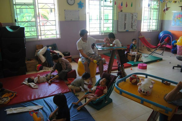 Playroom where volunteers interact with orphans
