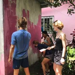 AMIGOS volunteers in Panama painting, 2022