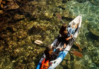 Kayaking to do snorkel survey