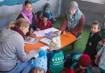 Teach eager to learn children in Nepal