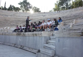 student at class in marble stadium