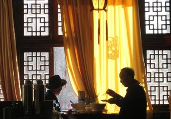 Two men drinking tea