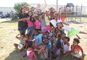 A happy group of children and volunteers in South Africa.