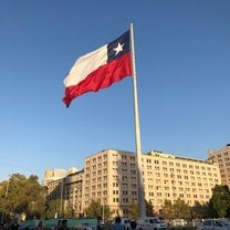 The Chilean flag at La Moneda, the Presidential Palace in Santiago de Chile.