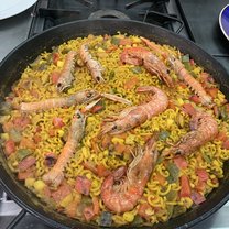 Make seafood paella in the cuisine class USAC Alicante offers