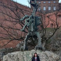 Posing with the dragon statue in Krakow - we couldn't quite get it in the picture, but every 10 minutes or so the dragon actually breathes fire!!