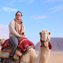 camel riding in wadi rum