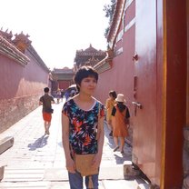 Me standing alone at one of the gates in Forbidden City