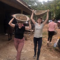 This is an image of two of us working. We were given head scarves by the locals to help us carry our materials for building.