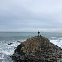 On top of the rocks at Giant's Causeway in Northern Ireland. This was included as one of the AIFS trips and was the best trip! 
