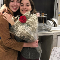 Me and my girlfriend Maria hugging with flowers