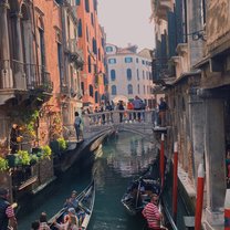 A canal with gondolas in Venice.