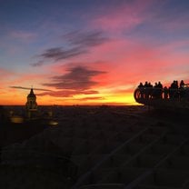 Sunset view from the top of Las Setas, a famous landmark in Seville, Spain