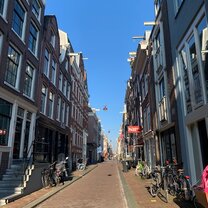 Classic street in Amsterdam with bikes and old buildings