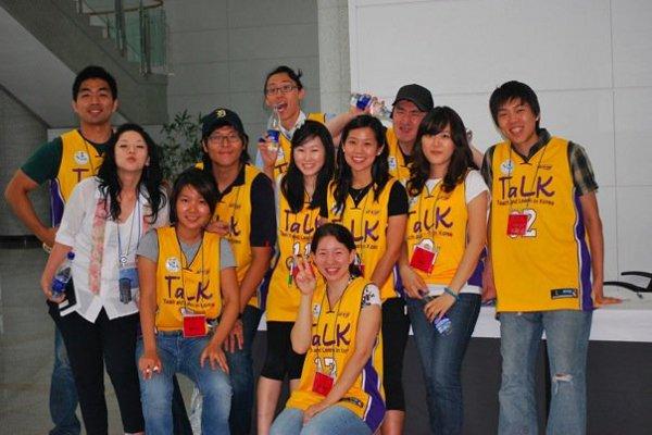A group of interns wearing TaLK jerseys