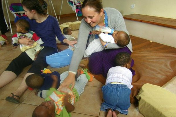 Shannon volunteering with children at an orphanage in Tanzania