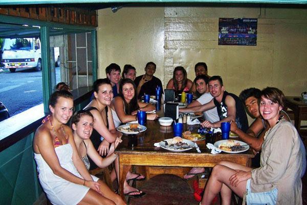 Estevan having breakfast with friends in Puerto Viejo