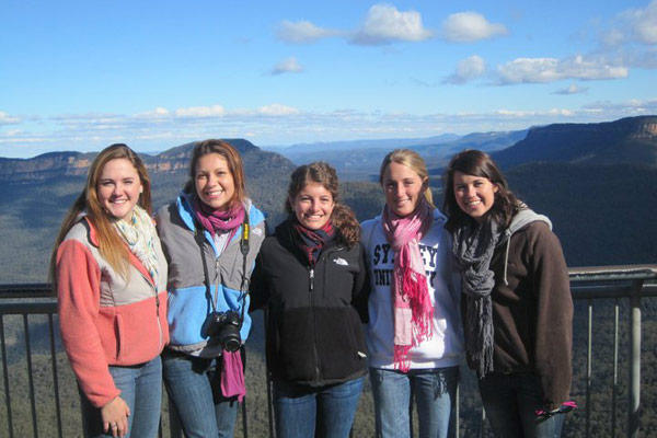 Randi and some friends in front of the Blue Mountains in Australia