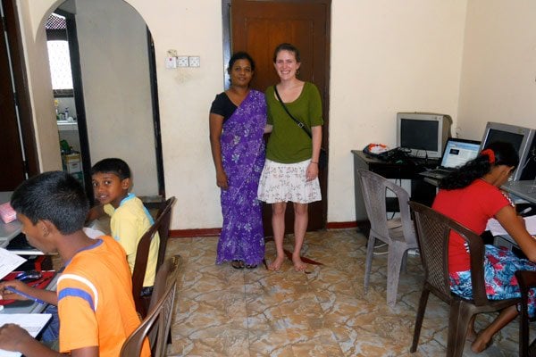 Carmen with a teacher and her students in Sri Lanka