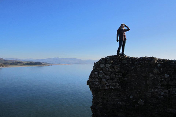 Shanna standing on part of the Criccieth Castle ruins