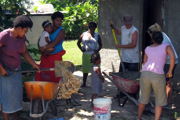Volunteers helping with community development in Fiji
