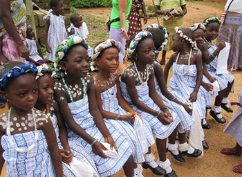 girls in Ghana at a formal celebration