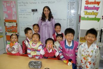 Alexa and students celebrating the holiday, Chuseok, in traditional clothing