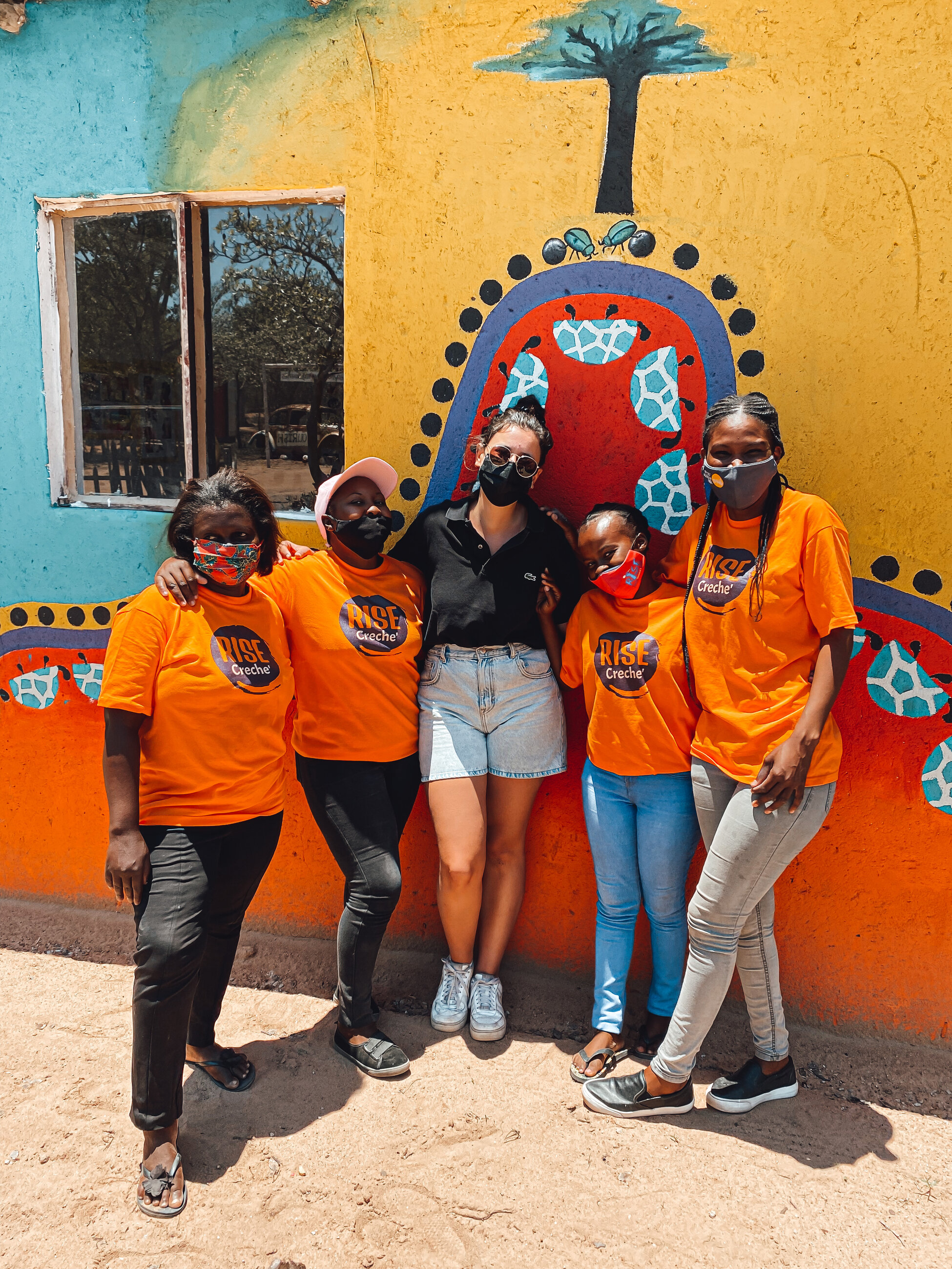 The crèche team and the crèche kids